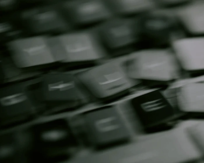 A blurred close up of a keyboard